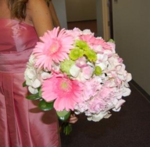 bride's bouquet of gerberas, hydrangeas, spray roses, and button mums