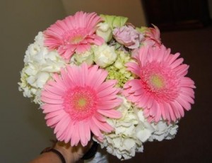 bride's bouquet of gerberas, hydrangeas, spray roses, and button mums