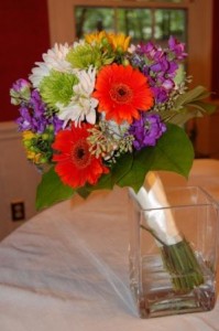 brides bouquet of gerberas, stock, roses, mums, and seeded eucalyptus