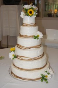 cake with flowers and raffia