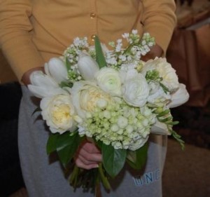 bride's bouquet of garden roses, mini hydrangea, lilac, tulips, freesia, and ranunculas