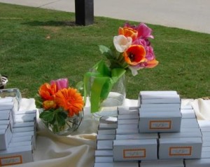 geberas and lilies on the gift table