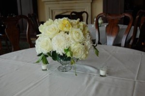 roses, football mums, and freesia arrangement