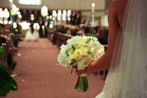 bride with bouquet walk the aisle