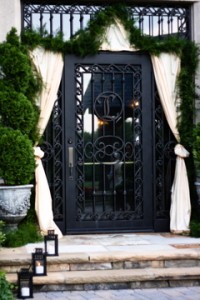 lanterns and garland flank the reception doorway