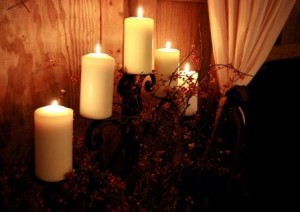 large candles and berries