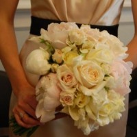 bride's bouquet of poenies, roses, and freesia
