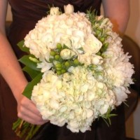 Bride's bouquet of hydrangea, fresia, roses, and hypericum